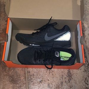 Tennis shoes. Never worn.